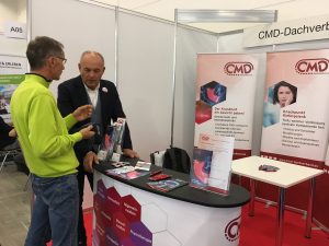 Im Gespräch am Stand: Dr. Jan V. Raiman, 1. Vorsitzender des CMDD